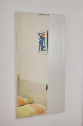 a view of a bedroom through a window at Guest House Marija in Bol
