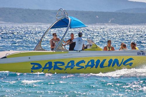 a group of people on a boat in the water at Guest House Marija in Bol