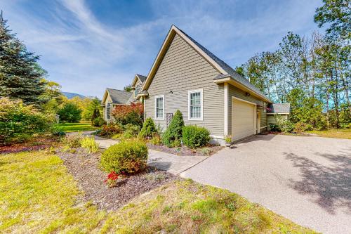 a house with a driveway in front of it at Saco River & White Mountain Views in Conway
