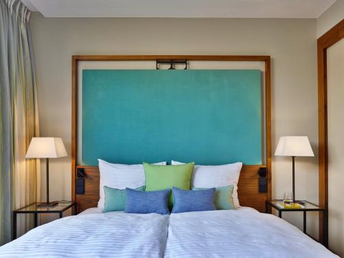 EST Grand Hotel Savoyにあるベッド