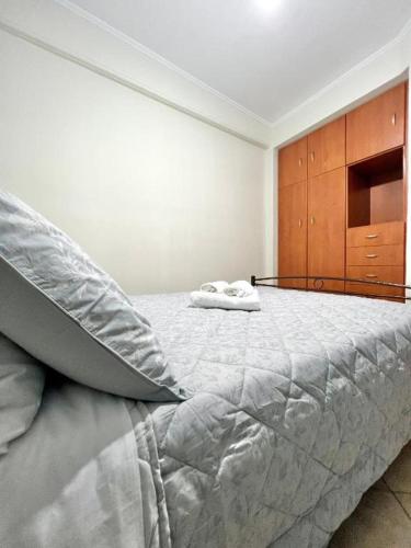 Postel nebo postele na pokoji v ubytování Ecco Apartments III