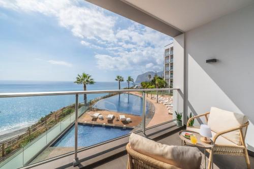 a balcony with a view of the ocean at Madeira Palace III by An Island Apart in Funchal