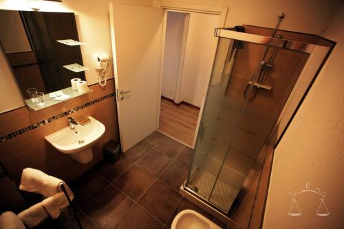 Koupelna v ubytování La Libra Rooms