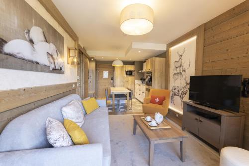 TV o dispositivi per l'intrattenimento presso Résidence l'Hévana - Appartements de Prestige Méribel Centre