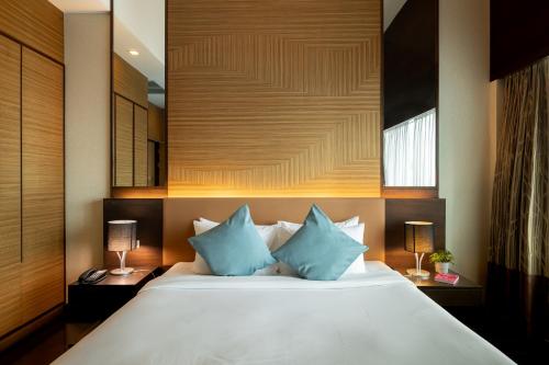 Postel nebo postele na pokoji v ubytování Jasmine Resort Bangkok