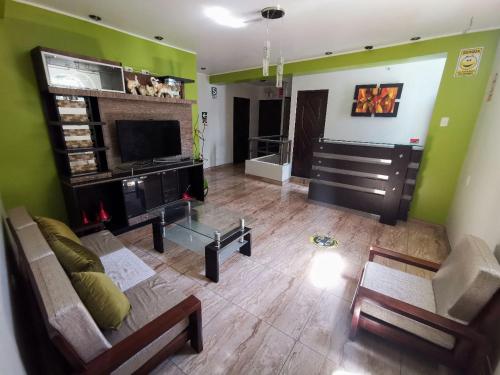 TV a/nebo společenská místnost v ubytování Hostal "Vista del Valle"