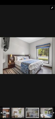 a bedroom with a bed and a window at Canmore Mountain Retreat. Hot Tub, Pool, King Bed! in Canmore