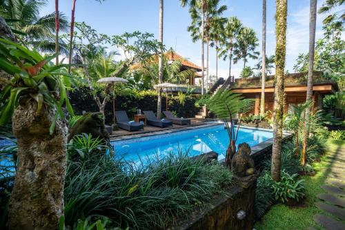 Bazén v ubytování Budhi Ayu Villas and Cottages Ubud by Mahaputra-CHSE Certified nebo v jeho okolí