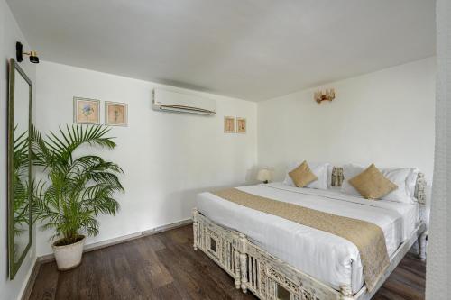Cama o camas de una habitación en Swaroop Vilas - Lake Facing Boutique Hotel