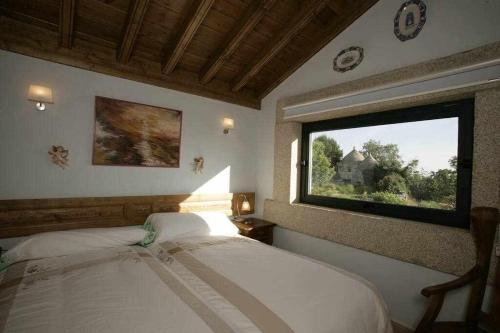 Säng eller sängar i ett rum på Vistas espectaculares en nuestro Apartamento EL Carpintero