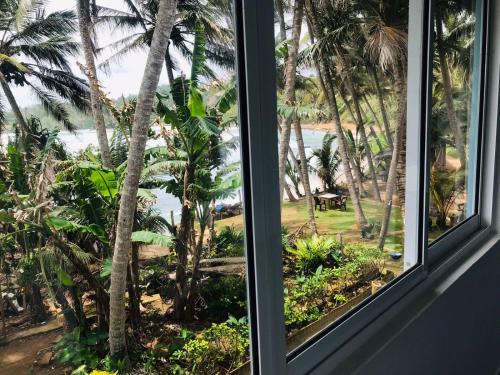 Κήπος έξω από το Surf Home Stay Hiriketiya
