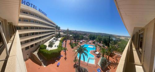 an overhead view of a resort with a swimming pool at Beatriz Toledo Auditorium & Spa in Toledo