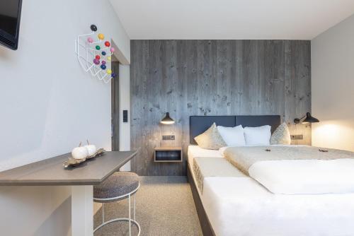 Postel nebo postele na pokoji v ubytování Haus Verwall