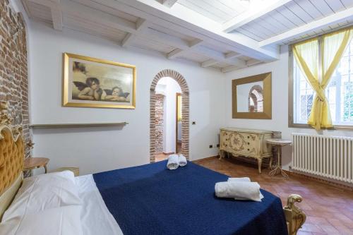 เตียงในห้องที่ De'Gombruti, Bologna by Short Holidays