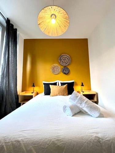 Postel nebo postele na pokoji v ubytování Délice de dune - Quartier de France