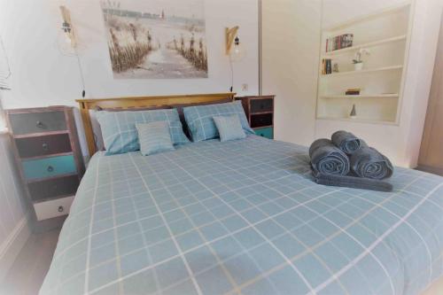 Ένα ή περισσότερα κρεβάτια σε δωμάτιο στο Royal William Yard Welcome Retreat