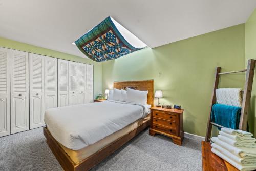 Ένα ή περισσότερα κρεβάτια σε δωμάτιο στο Getaway Condo