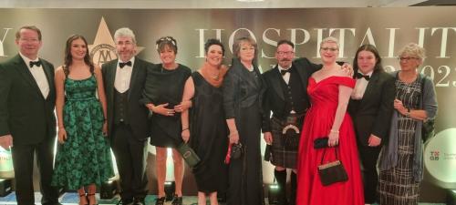 a group of people posing for a picture at an event at Crug Glas Country House in St. Davids