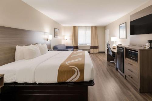 Postel nebo postele na pokoji v ubytování Quality Inn