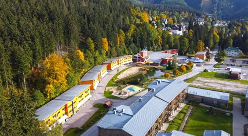 an aerial view of a building in the mountains at Resort Špindl in Špindlerův Mlýn