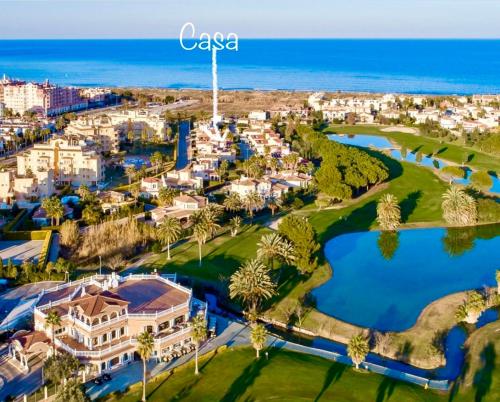 Villa con jardín en Oliva Nova Golf a 100m de la playa