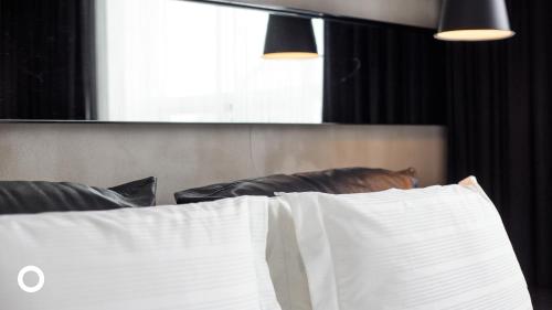 Postel nebo postele na pokoji v ubytování Thingholt by Center Hotels