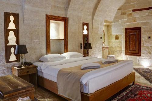 Katil atau katil-katil dalam bilik di Dionysos Cave Cappadocia Hotel