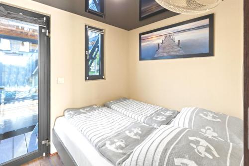 Postel nebo postele na pokoji v ubytování Houseboat villa.nautica