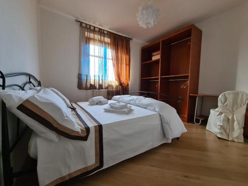 Postel nebo postele na pokoji v ubytování Casa di Anna a Perugia