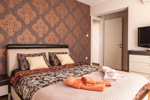 Ένα ή περισσότερα κρεβάτια σε δωμάτιο στο Apartman Jana
