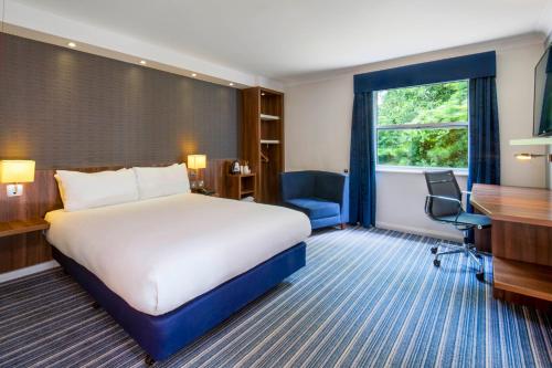 Tempat tidur dalam kamar di Holiday Inn Express York, an IHG Hotel