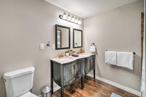 a bathroom with a sink and a toilet at Dreamy Riverside Cabin with Fireplace and Grill in Concrete