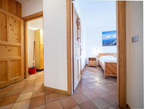 Postel nebo postele na pokoji v ubytování Coop Paradisin Apartment - AlpineEscape