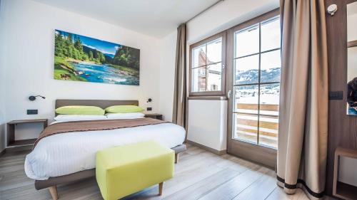 Cama o camas de una habitación en Chalet 4 Stagioni - AlpineEscape