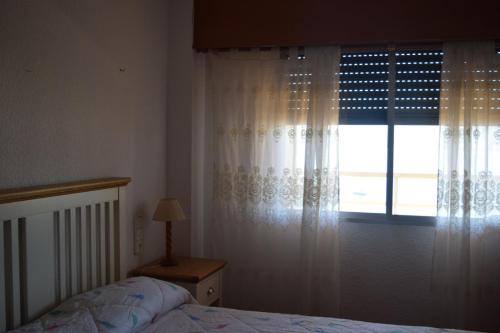 Postel nebo postele na pokoji v ubytování Apartamento Florazar 2, 10ºC Cullera