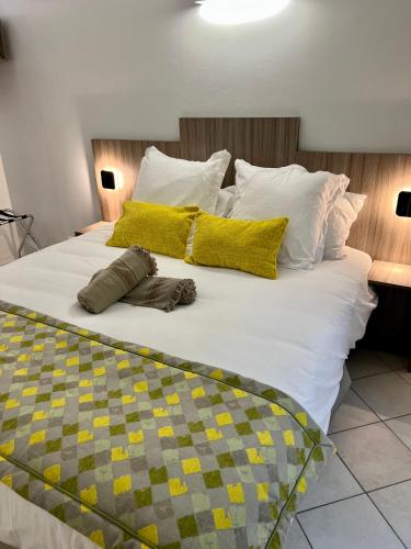 Ένα ή περισσότερα κρεβάτια σε δωμάτιο στο Marina Hill Appartement vue mer