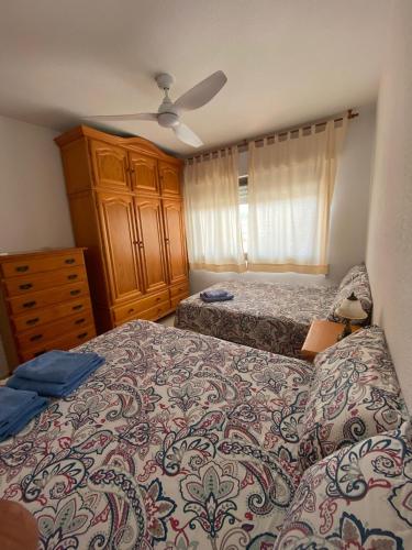 Postel nebo postele na pokoji v ubytování Mandala beach