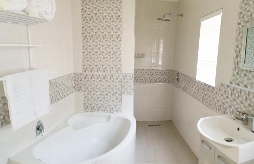 Ein Badezimmer in der Unterkunft Mi Vida Guesthouse