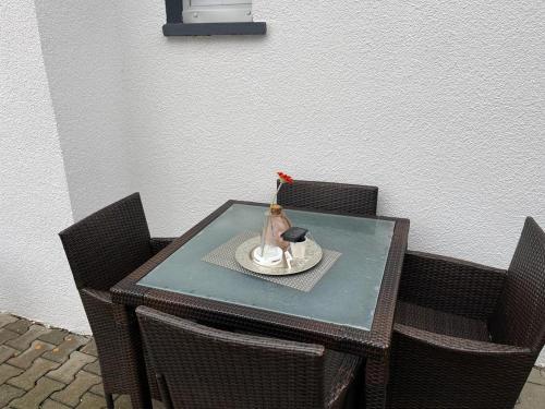 a table with a figurine sitting on top of it at Elida 2 in Burgrieden