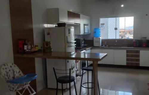 Kuchyň nebo kuchyňský kout v ubytování Casa em Resende-RJ