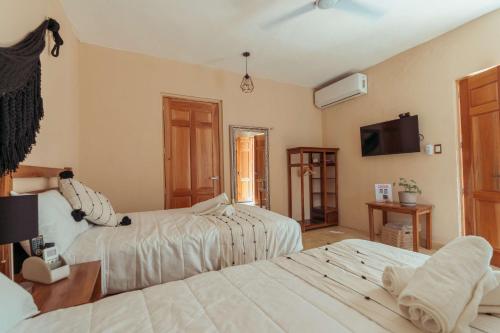 Katil atau katil-katil dalam bilik di Hotel Casa Piedad