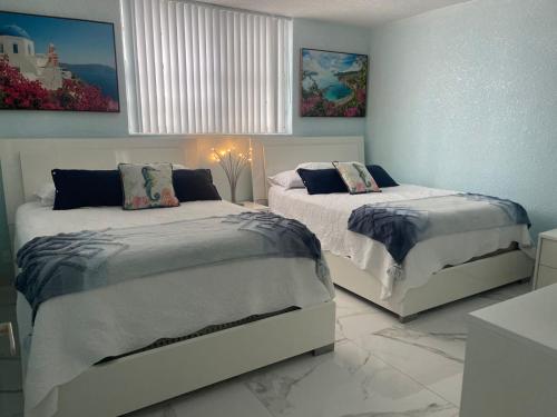 Postel nebo postele na pokoji v ubytování Ocean view Hollywood