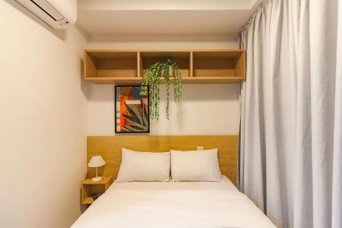 Cama o camas en una habitación en Estrenar Estudio con Gimnasio, cerca del parque de Ibirapuera y del metro - ID 13