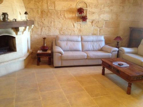 Posezení v ubytování Gozo Sea and Country view Rooms