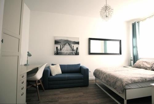 Ένα ή περισσότερα κρεβάτια σε δωμάτιο στο Zamojska Residence Apartments