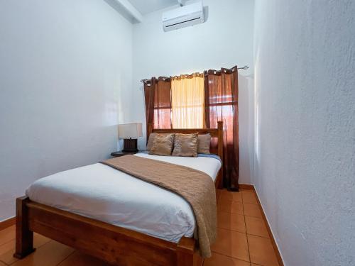 Posteľ alebo postele v izbe v ubytovaní Villa Paraíso Mango 4, Steps from the Beach & Free WIFI