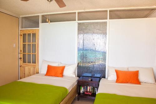 Ένα ή περισσότερα κρεβάτια σε δωμάτιο στο Montego Bay Club Apartments