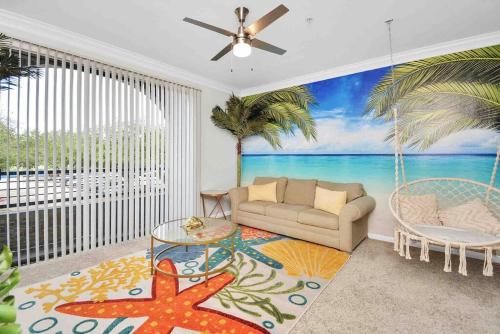 a living room with a painting of the ocean at Island Paradise -2Bedroom /2Bath/NRG/MedCenter/Galleria in Houston