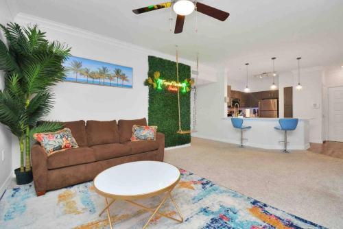a living room with a couch and a table at Tropical Paradise- 2Bedroom/2Bath/NRG/MedCenter/Galleria in Houston