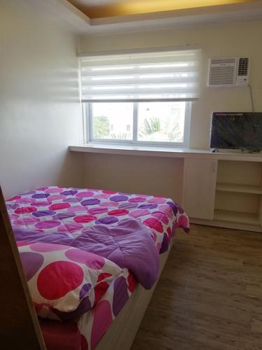 Postel nebo postele na pokoji v ubytování Stanford Suites 2 Lilian